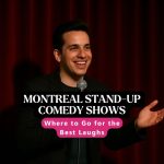 A smiling stand-up comedian performs on stage in front of a red curtain at a Montreal comedy club, holding a microphone and engaging the audience.